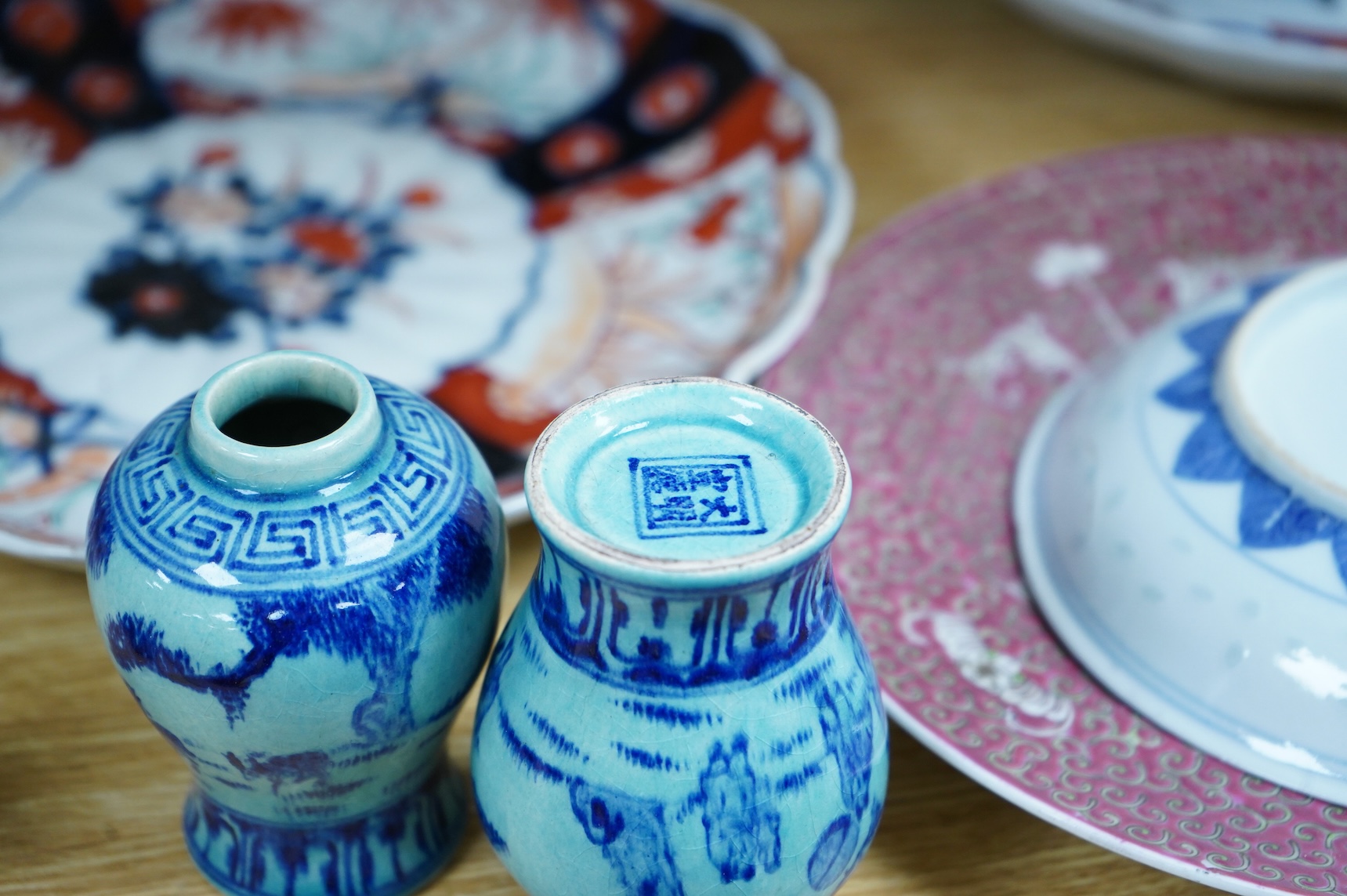 A collection of Asian ceramics to include an inside painted glass snuff bottle, pink ground dish and an Imari dish